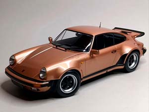 PORSCHE 911 TURBO -1977 PINK METALLIC 1:12